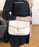 LV Pochette Metis Monogram Empreinte Leather Creme
