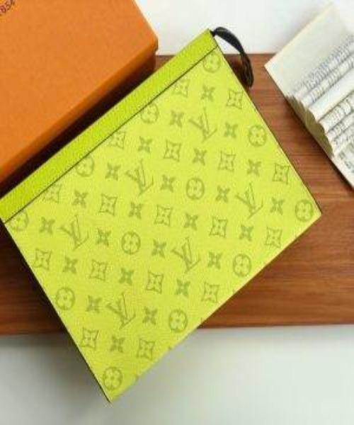 Louis Vuitton Pochette Voyage Neon Yellow in Monogram Coated Canvas/Taiga  Cowhide Leather with Palladium-tone - US